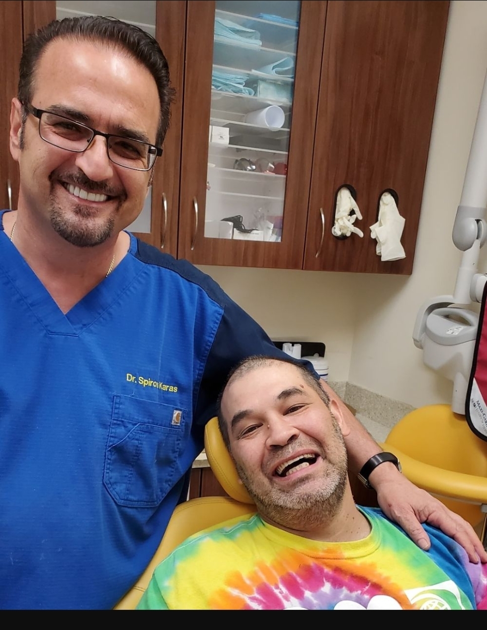 Dr. Spiros Karas with a patient at Classic Dental Arts in Manalapan, New Jersey.