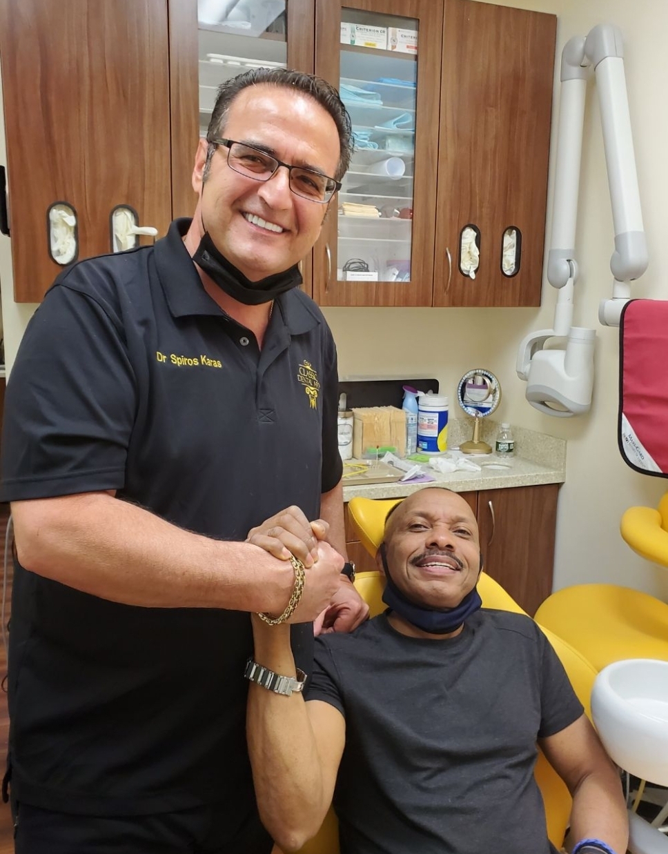 Dr. Spiros Karas with a patient at Classic Dental Arts in Manalapan, New Jersey.