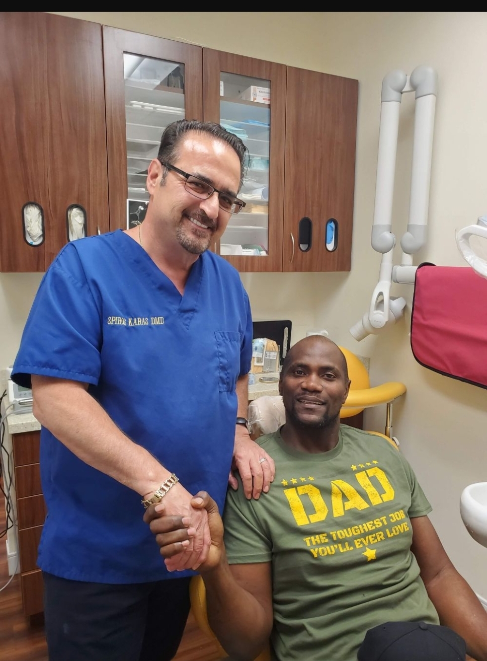 Dr. Spiros Karas with a patient at Classic Dental Arts in Manalapan, New Jersey.