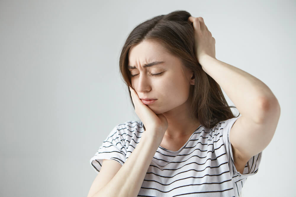 Facial pain suggesting possible dental issue