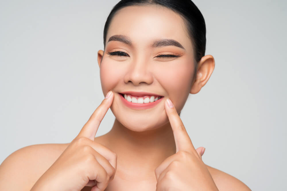 a woman flaunting her beautiful smile
